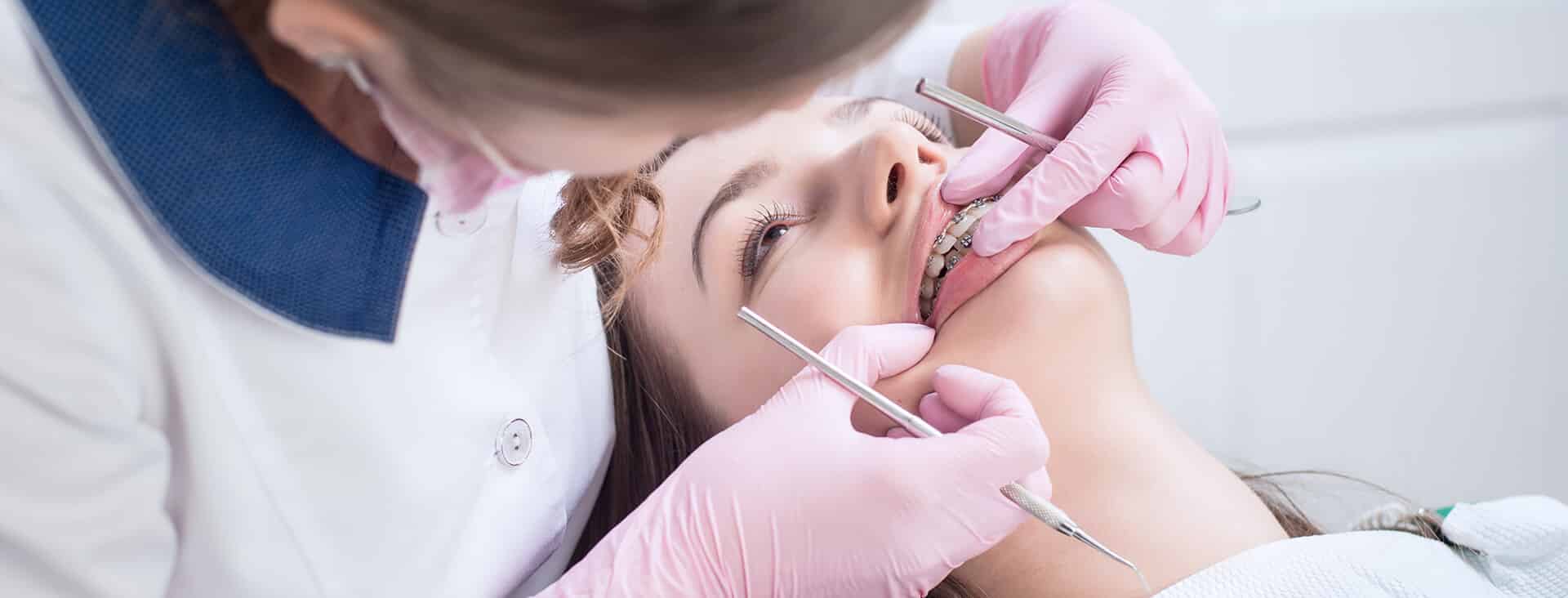 Patient receiving dental care in a treatment room