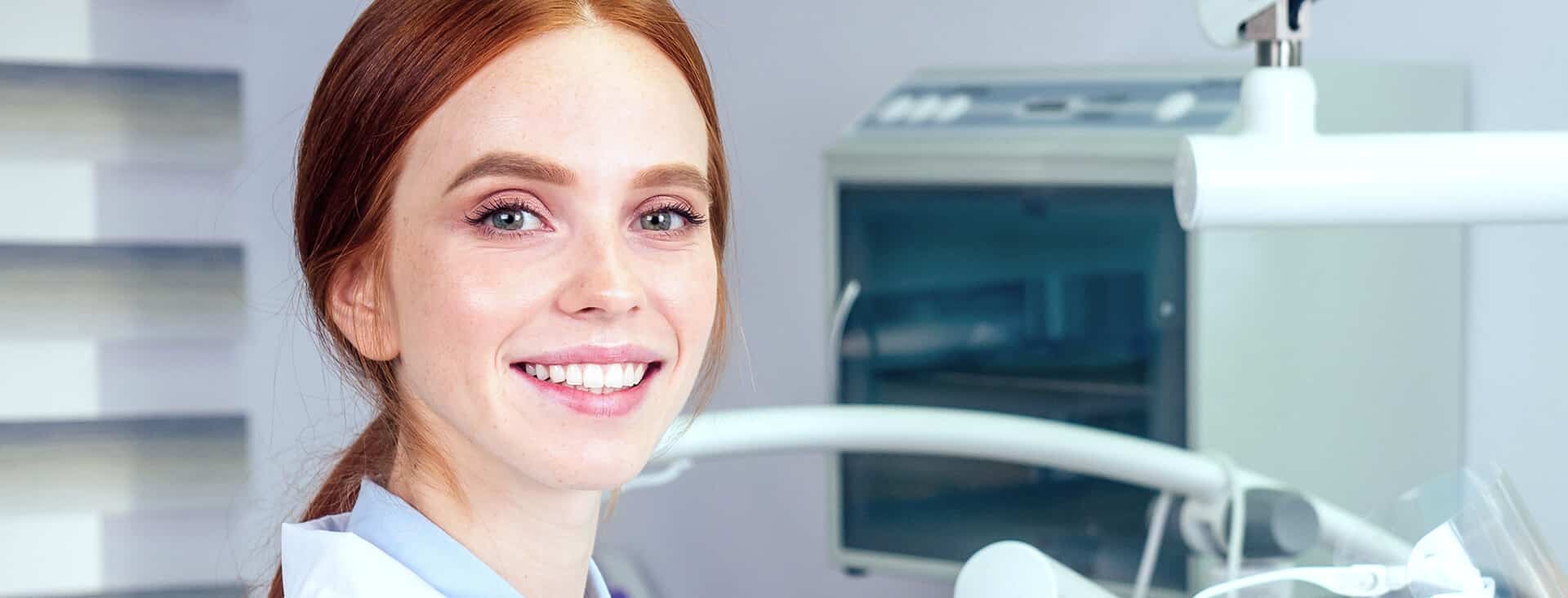Dental professional in a treatment room